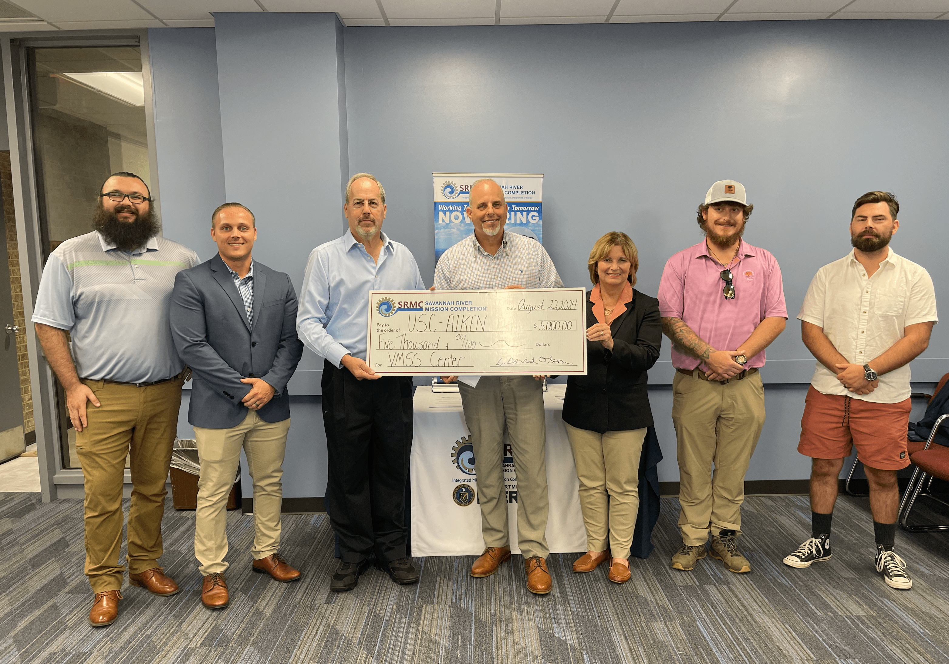 From left to right: Tristan Stone, Calab Harmen, George Matis, Robert A. Murphy, Mary Driscoll, Mick Foster, and Travis Farrell
